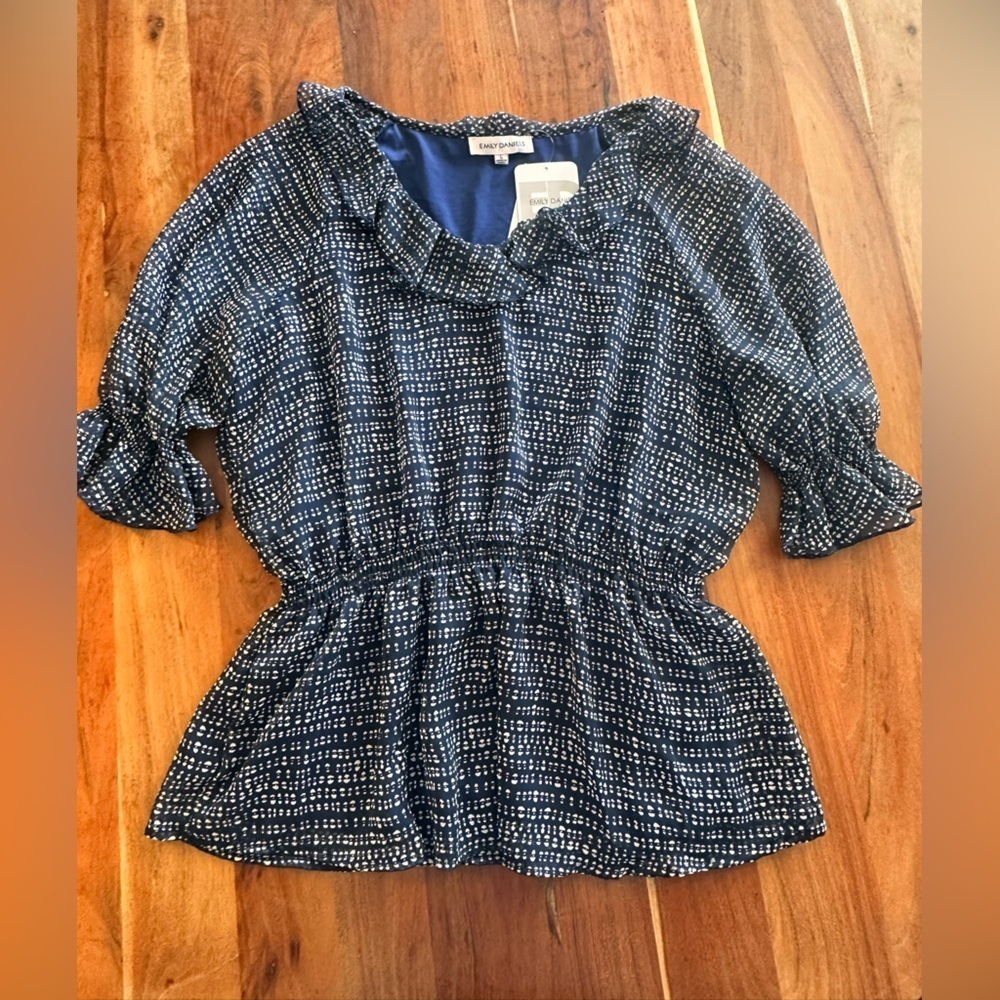 Emily Daniel’s Blue Textured ruffled peplum Blouse